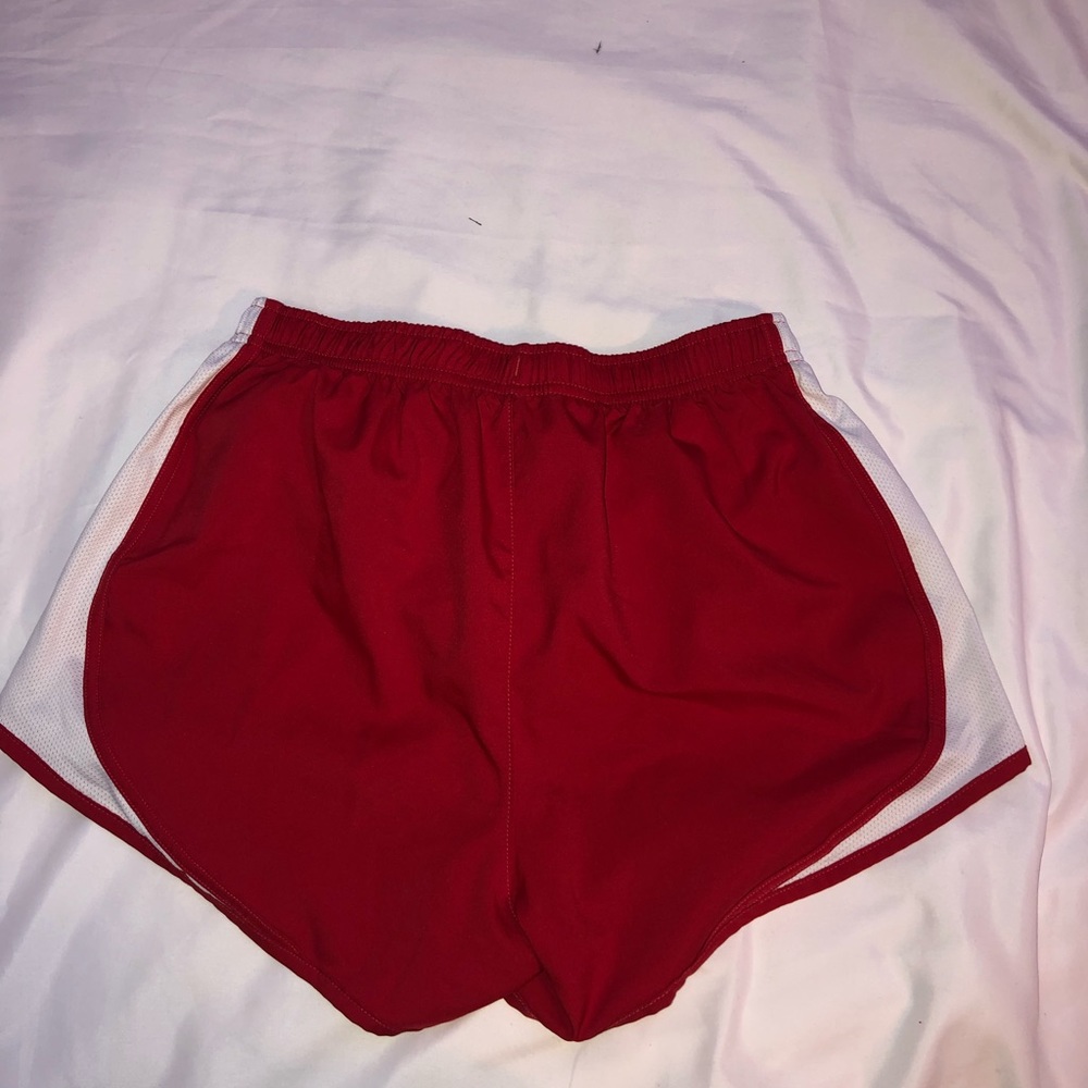 Red Nike shorts